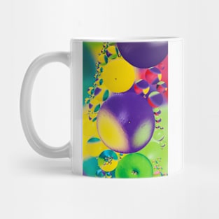 Colorful close up of oil drops in water Mug